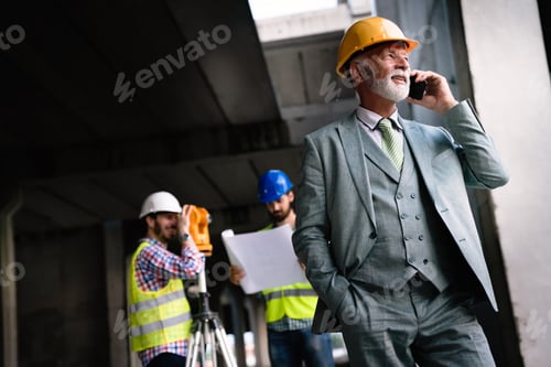 Preview: Architects, business manager and engineer meeting project at construction site