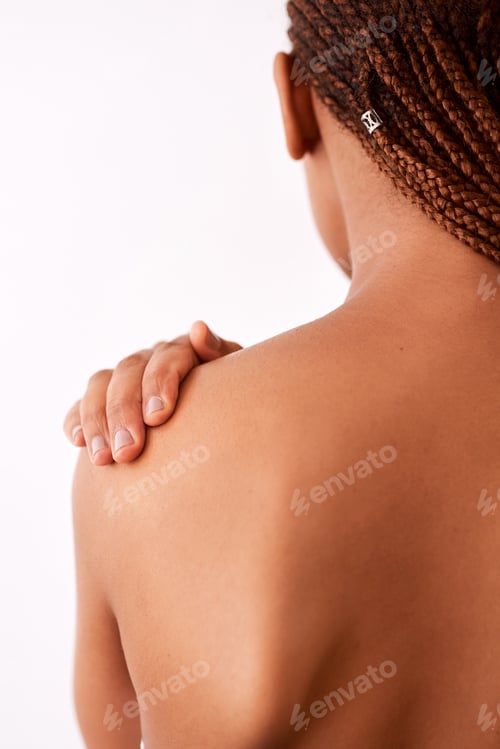 Preview: My skin feels and look good. Studio shot of an unrecognizable woman touching her shoulder.