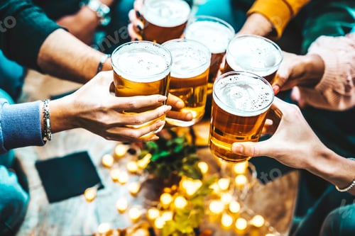 Preview: Group of people drinking beer at brewery pub restaurant