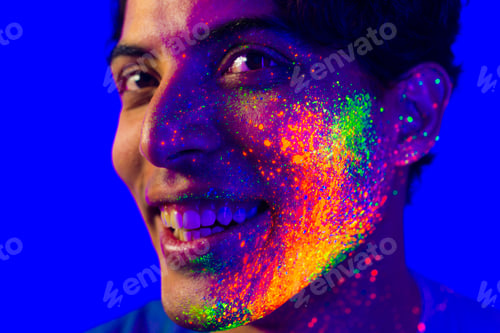 Preview: Fashion model with fluo painting on the face