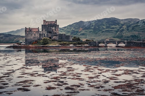 Preview: Breathtaking dusk over loch at Eilean Donan Castle in Scotland