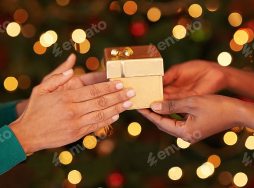 Preview: Tis better to give than to receive. Shot of two unrecognizable women exchanging gifts at Christmas.