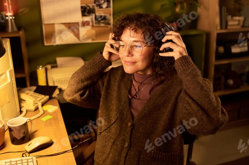 Preview: Portrait of Caucasian Woman Listening to Music with Headphones
