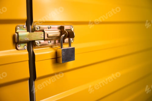 Preview: Yellow metal door with a lock