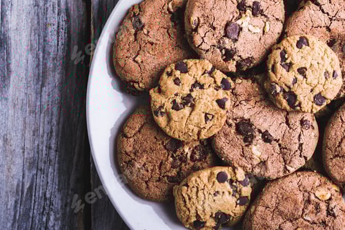 Preview: Delicious Chocolate Chip Cookies on a White Plate