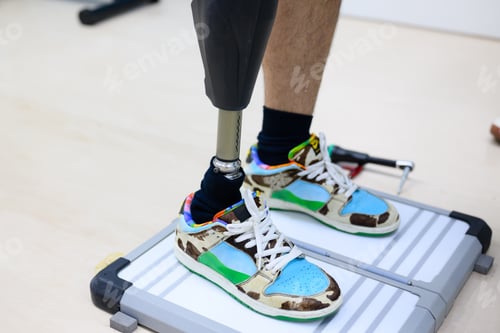 Preview: Disabled athlete patient with physical disability doing exercise