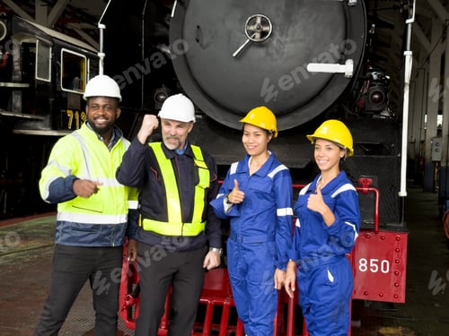 Preview: Industry engineer team worker teaching help friend operate control heavy machine in factory