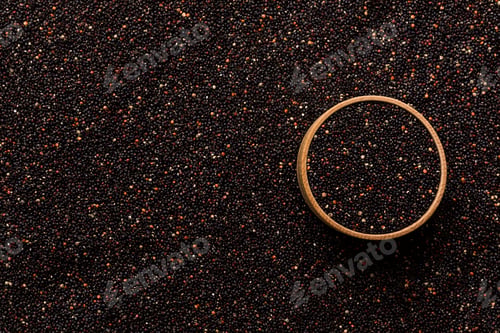 Preview: black quinoa grain in wooden bowl background and texture of gluten free top view