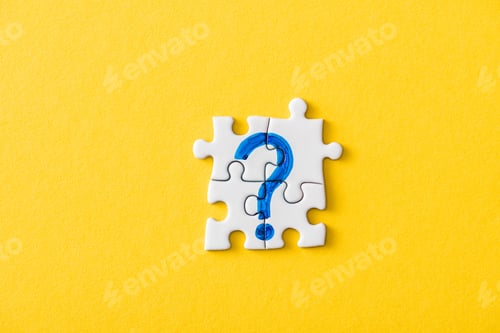 Preview: top view of connected puzzle pieces with drawn blue question mark on yellow