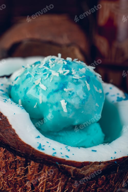 Preview: Blue ice cream in coconut bowl.