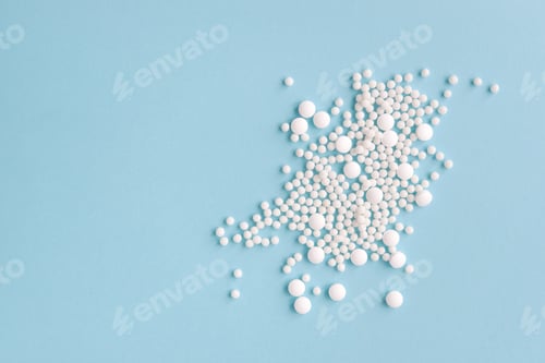 Preview: white pills on blue background