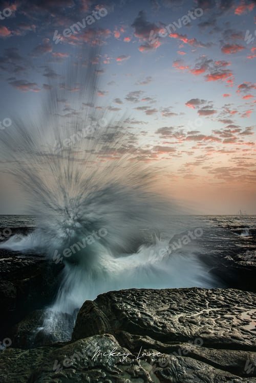 Preview: The splash of a wave at sunrise