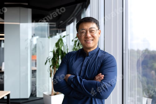 Preview: Portrait of successful asian businessman, man inside office wearing shirt and glasses smiling and