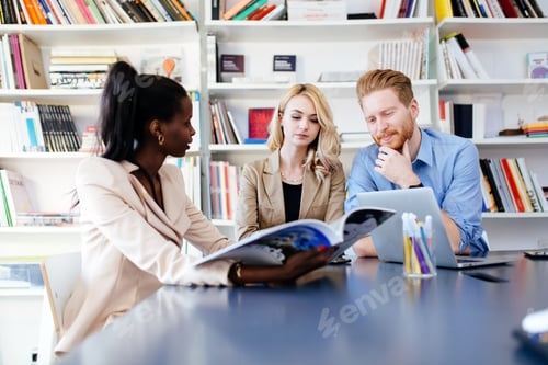 Preview: Businesspeople working in office
