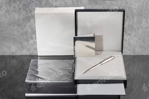 Preview: Branded pen with cufflinks and business card holder in a box. Gift set. Office interior.