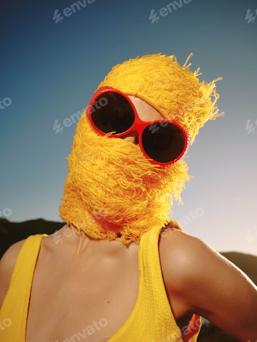 Preview: Woman, yellow dress, sunglasses, yellow wig a woman with a yellow wig and matching dress, wearing