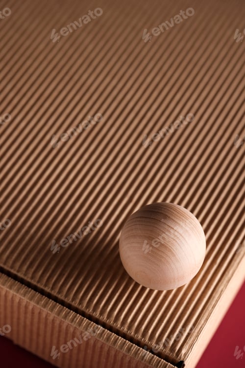 Preview: dimensional compositions of geometric shapes concept. wooden circle on texture box. copy space.