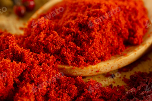 Preview: Paprika powder in wooden spoon