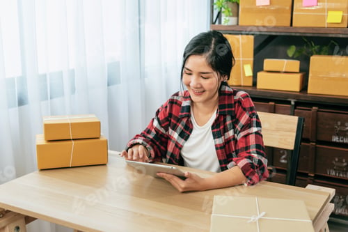 Preview: Online seller Close up hands Young asian woman typing laptop keyboard checking online order