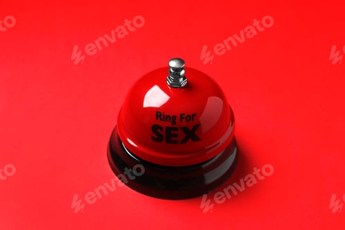 Preview: Sex bell on red background. Erotic role play