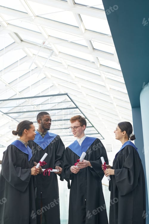 Preview: Diverse group of graduates in college