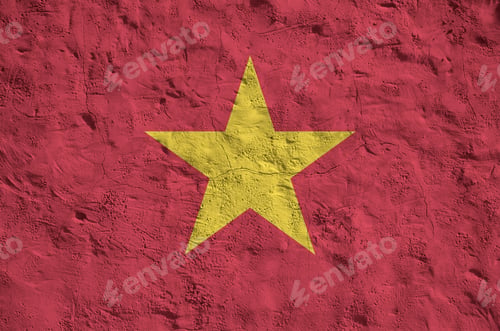 Preview: Vietnam flag depicted in bright paint colors on old relief plastering wall close up
