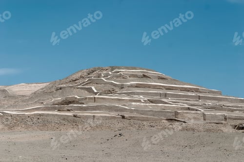 Preview: Standing tall against a vibrant blue sky, the ancient huaca pucllana pyramid ruins