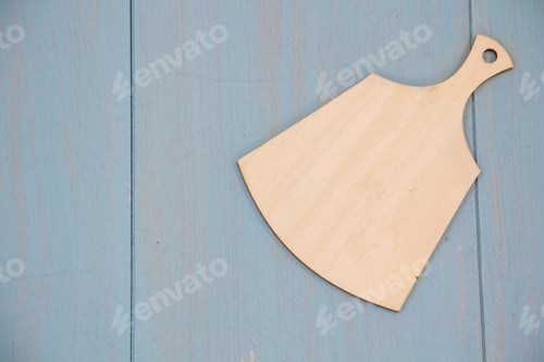 Preview: Empty vintage cutting board on planks food background concept. table. Top view