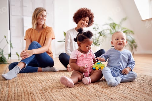Preview: Two Mothers Meeting For Play Date With Babies At Home In Loft Apartment