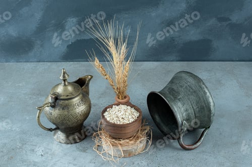 Preview: Muesli grains in a wooden cup on blue background