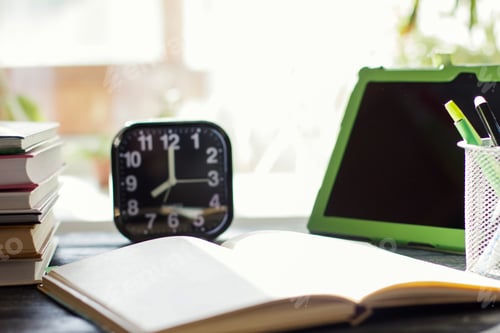 Preview: books and pc tablet on the table. study at school or university and modern education concept.