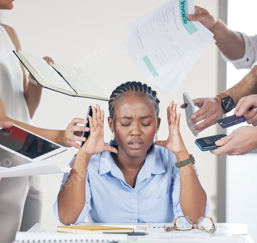 Preview: Could you all just leave me alone. Shot of a stressed businesswoman during a meeting.