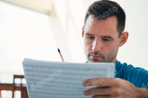 Preview: Young Musician Playing Guitar At Home