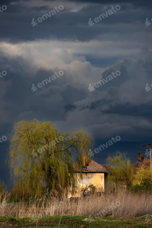 Preview: Old creepy haunted house on a stormy day