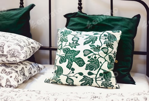 Preview: Cozy colorful pillows on bed