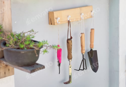 Preview: Gardening tools on the wooden dock