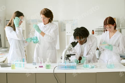 Preview: Scientists Collaborating in Modern Research Laboratory