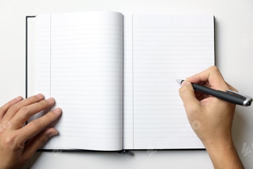 Preview: Empty note book with man hands hold a pen