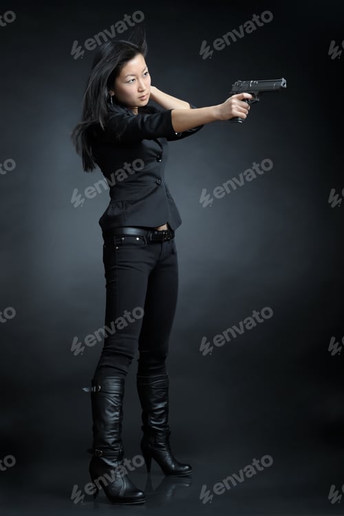 Preview: Asian Woman With A Pistol