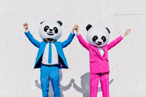 Preview: Storytelling image of a couple wearing giant panda head