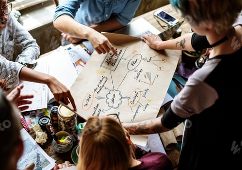 Preview: Colleagues working at a desk