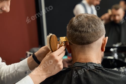 Preview: Barber working with iron razor and using brush.