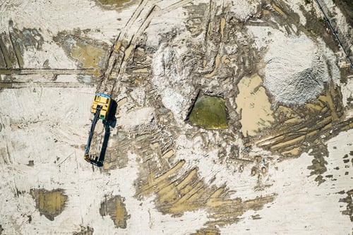 Preview: Aerial view of excavator at a construction site