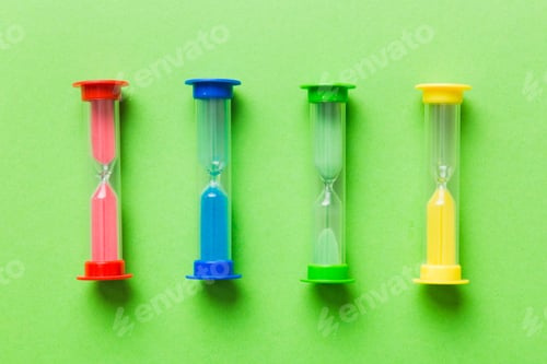 Preview: hourglass on the table, sand clock as time passing concept for business deadline, copy space