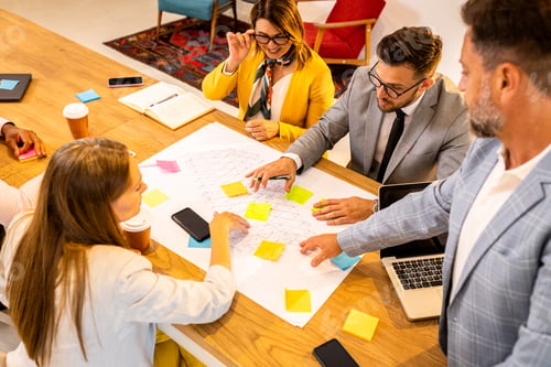 Preview: Group of business people working in office.