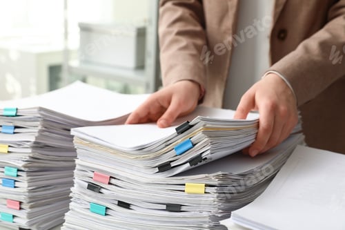 Preview: Woman working with documents in office, closeup