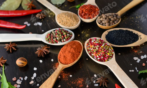 Preview: Spices and herbs on old kitchen table