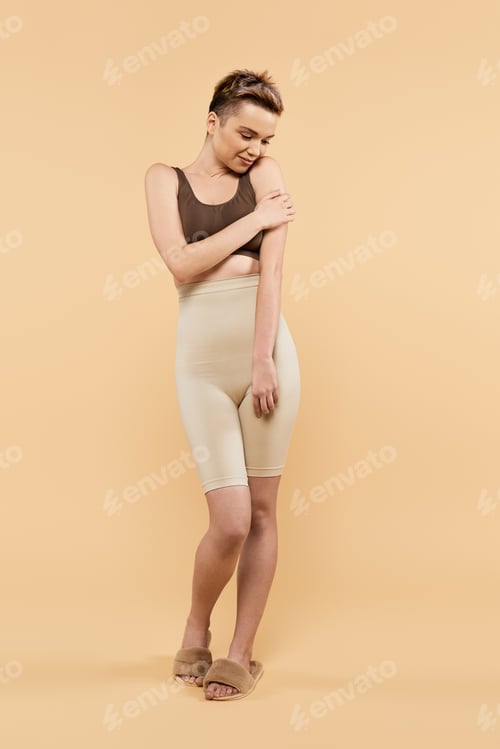 Preview: Woman Posing in Underwear with Muted Background