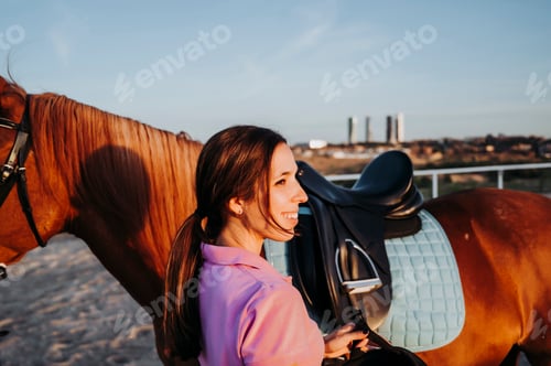 Preview: Woman wearing helmet for horseriding