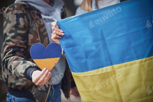 Preview: Two girls supports Ukraine with no war signs